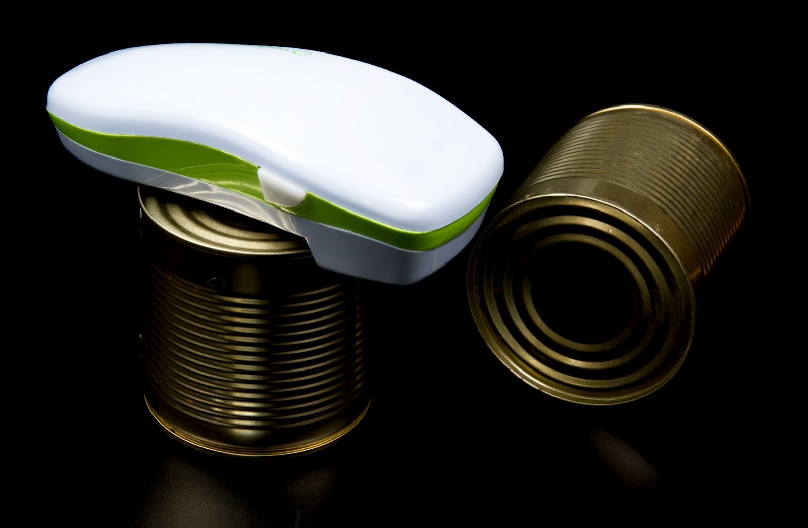 an electric can opener opening a can